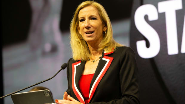 WNBA commissioner Cathy Engelbert makes opening remarks at a podium while announcing a WNBA expansion franchise in the San Francisco Bay Area.